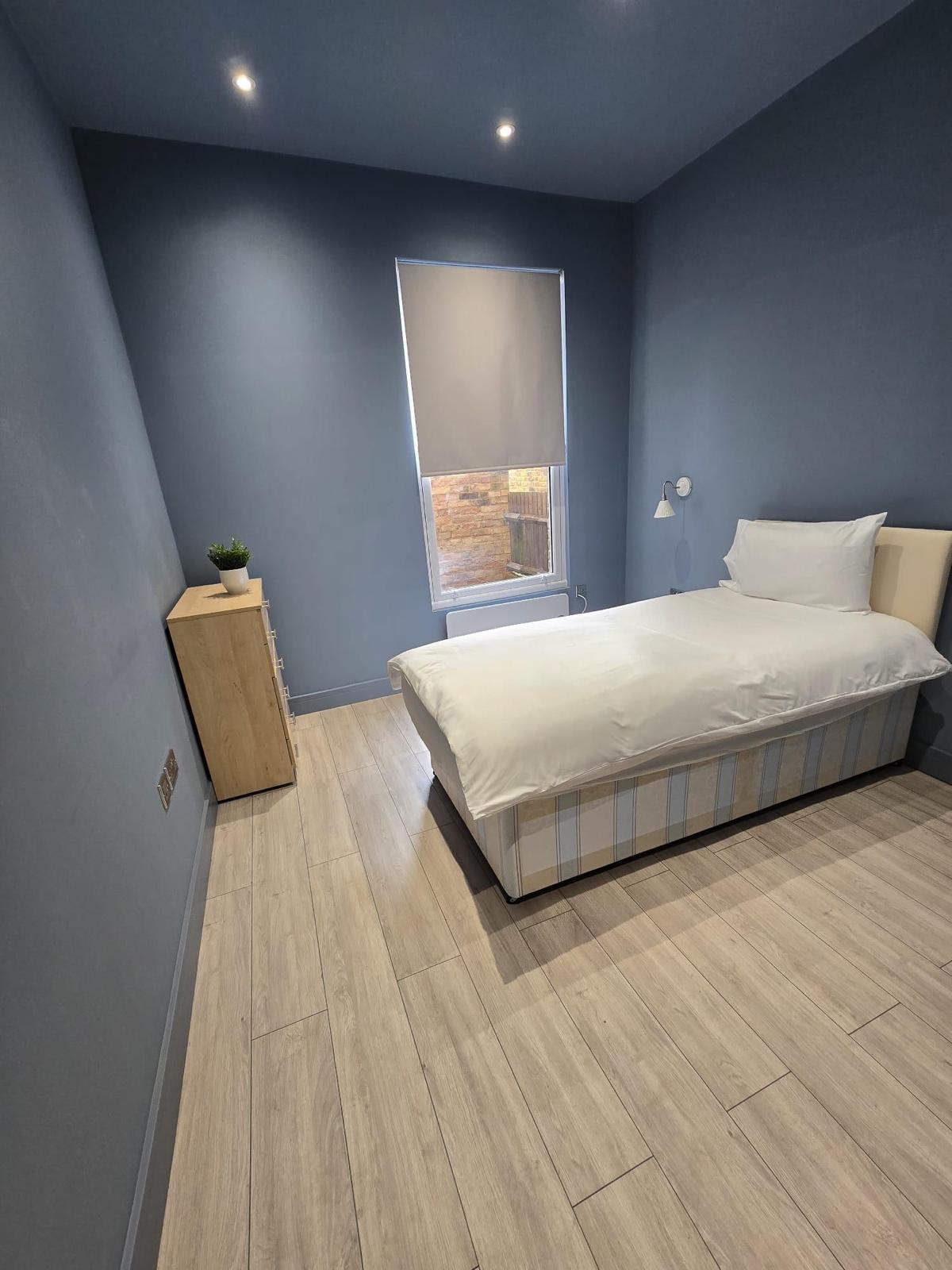 Despard bedroom with blue walls