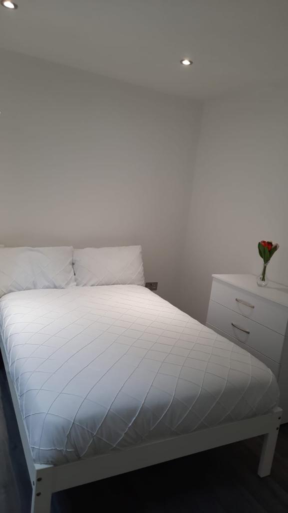 Ravenor Park bedroom with bedside table