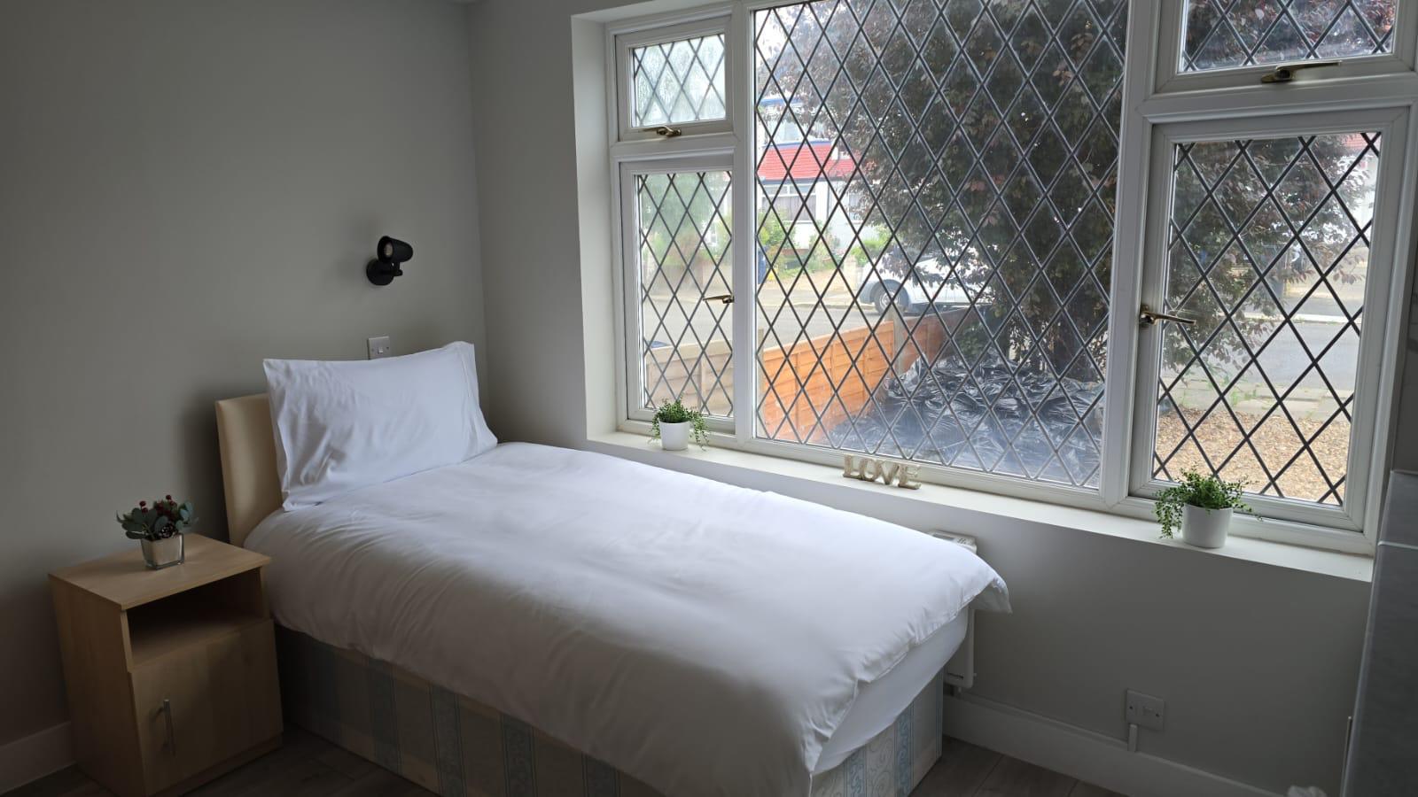 Worcester Gardens bedroom with diamond windows
